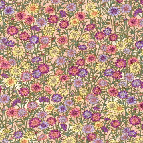 Japanese screen printed decorative chiyogami paper used in handmade cards. A dense floral pattern featuring small wildflowers in pink, purple, yellow, and orange with green stems on a warm beige background.